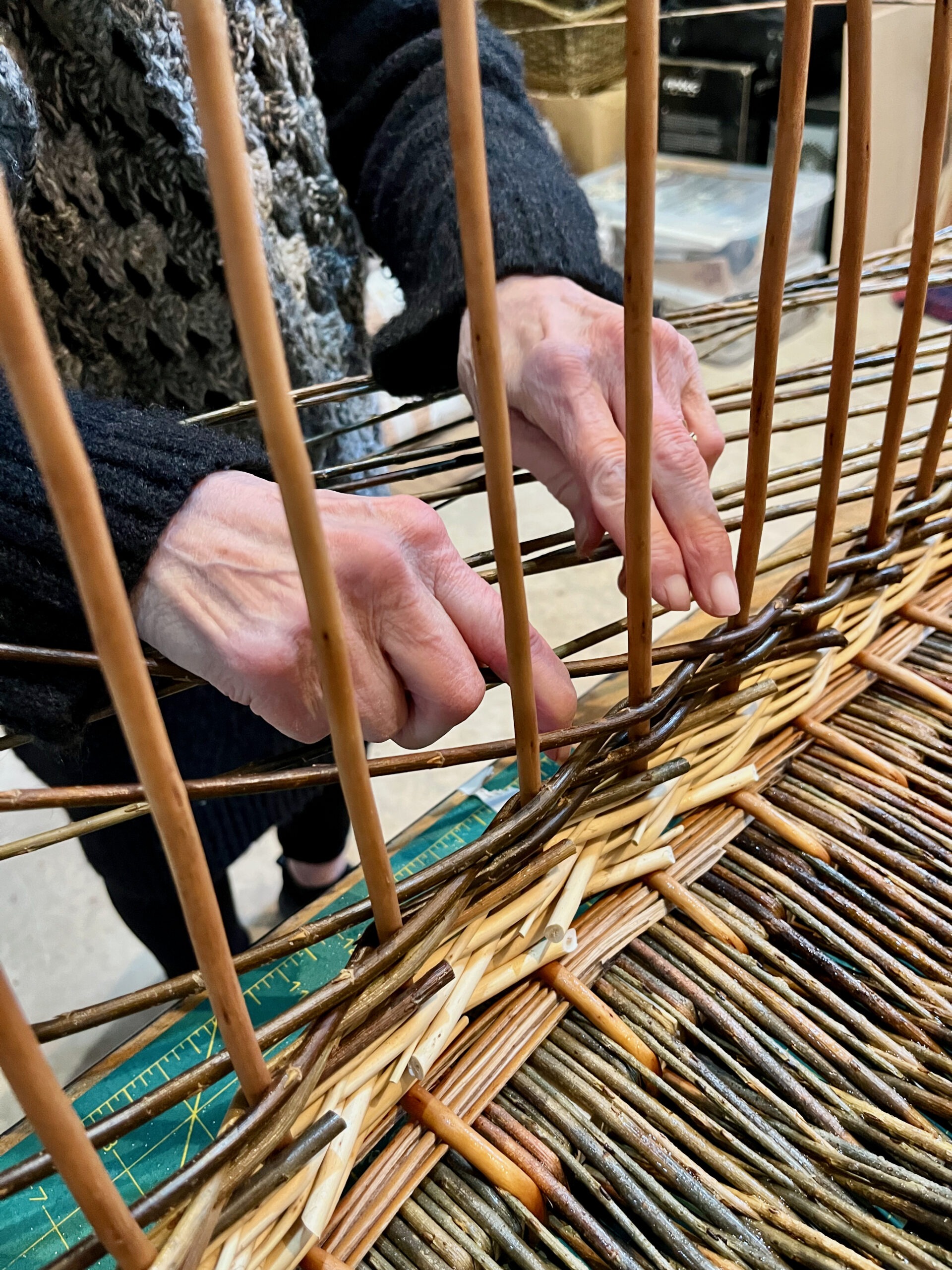 Hands weaving - a lady that came to weave her own coffin